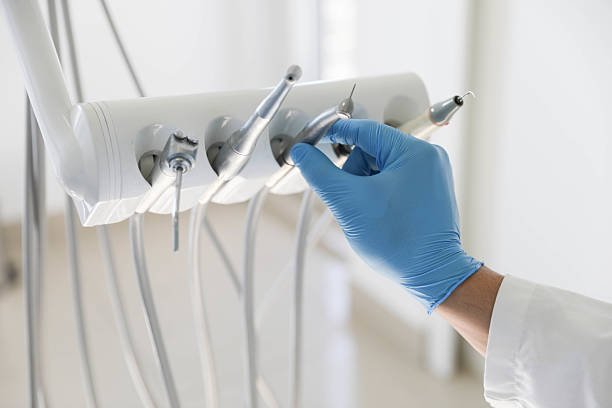 Professional Teeth Whitening technician working in Walls, MS